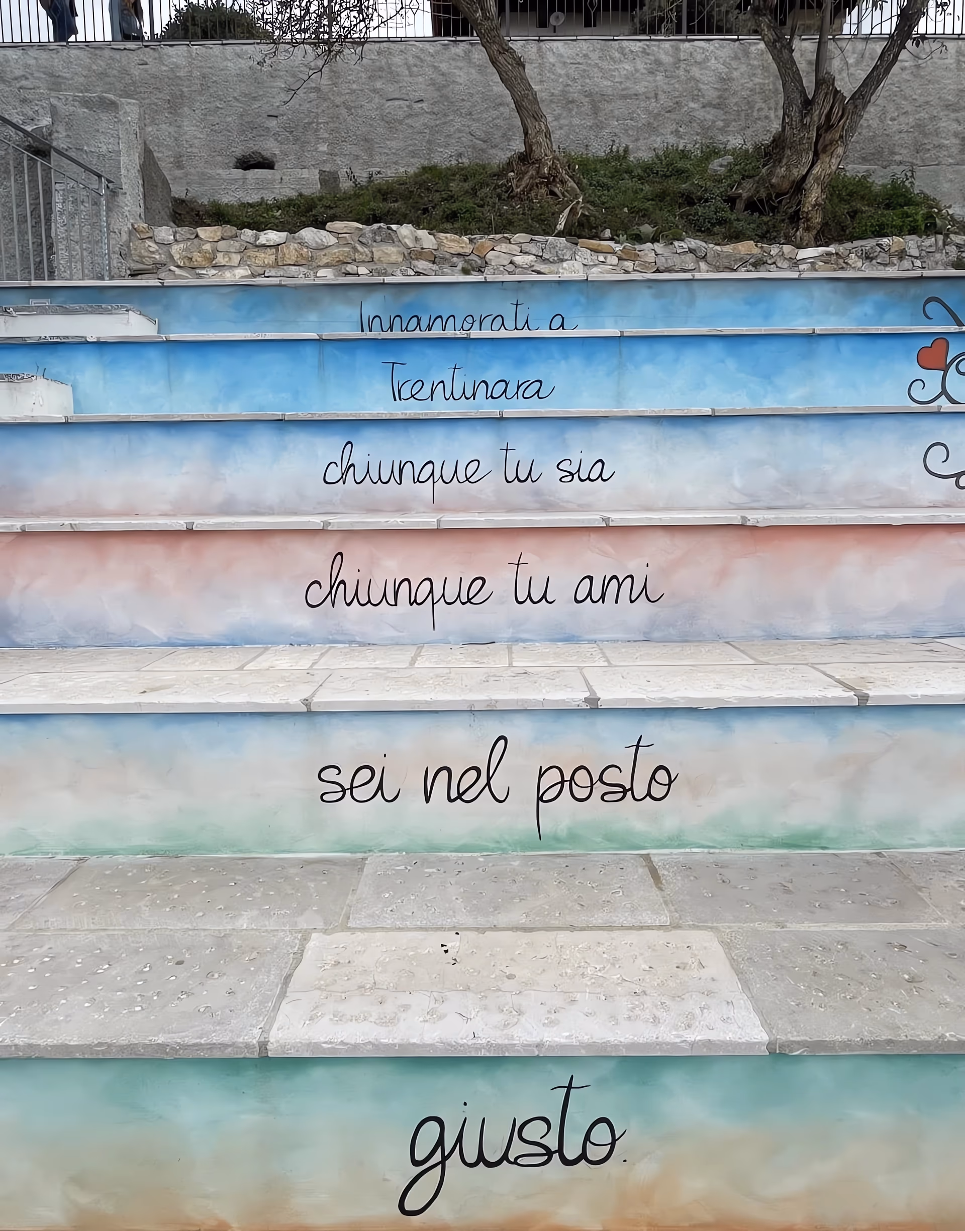 Detail of majolica tiles with poems on the walls